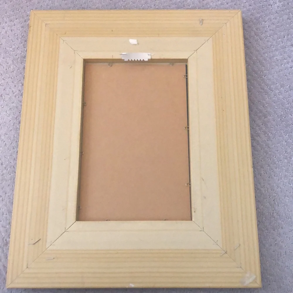 Wood framed mirror in gold